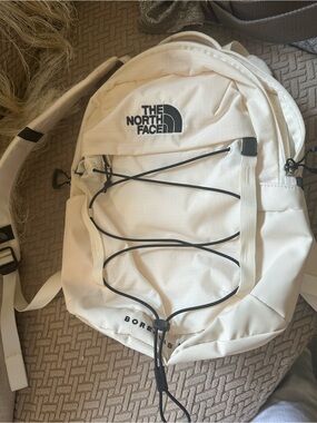 The North Face White Backpack with Black Bungee